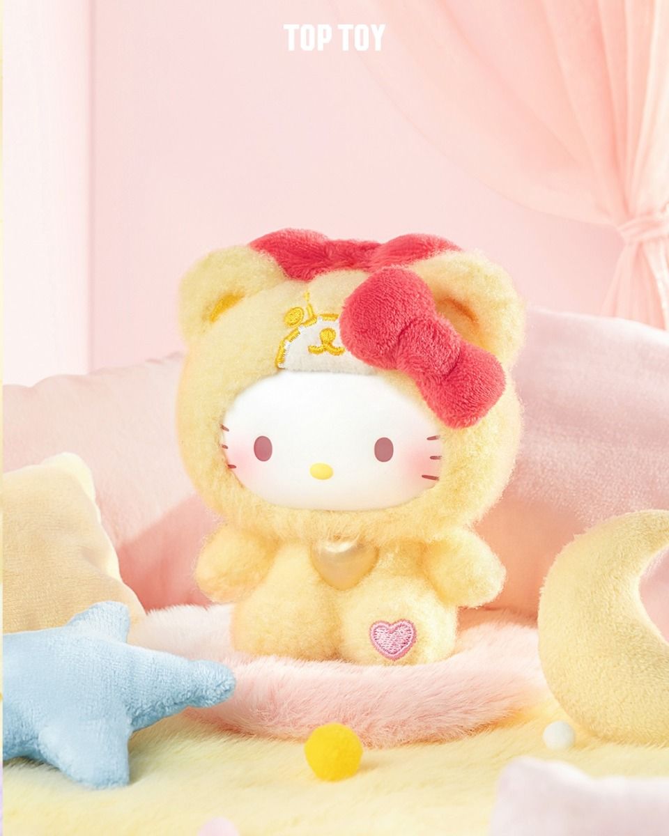 Sanrio Teddy Pajamas Plush Keychain Blind Box Series features Hello Kitty in a bear suit, set in a whimsical, pastel play scene. Preorder for November 2025 release.