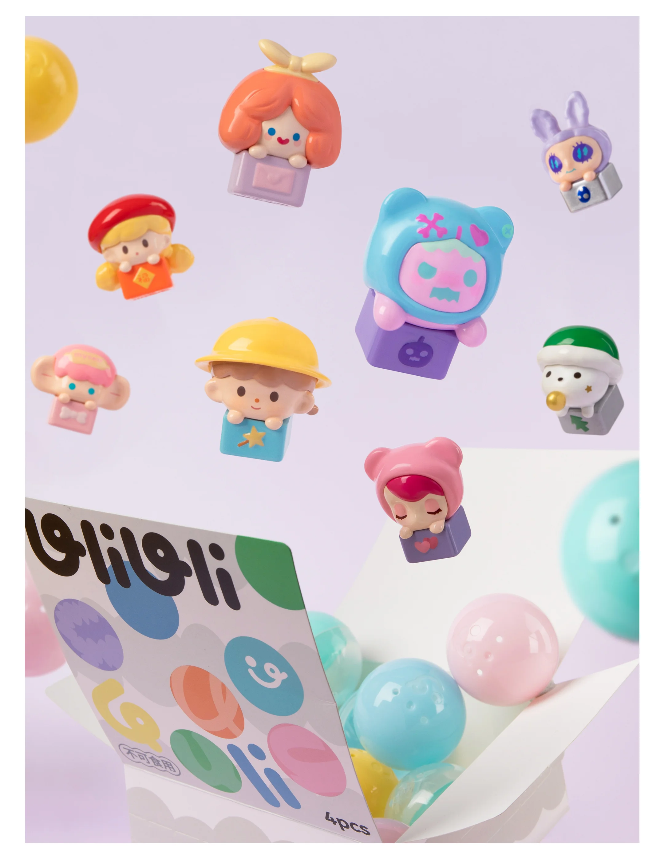 GIFT SERIES ULI ULI Blind Box Series: Small plastic toys including boy, girl figurines, cartoon character, and toy on stick.