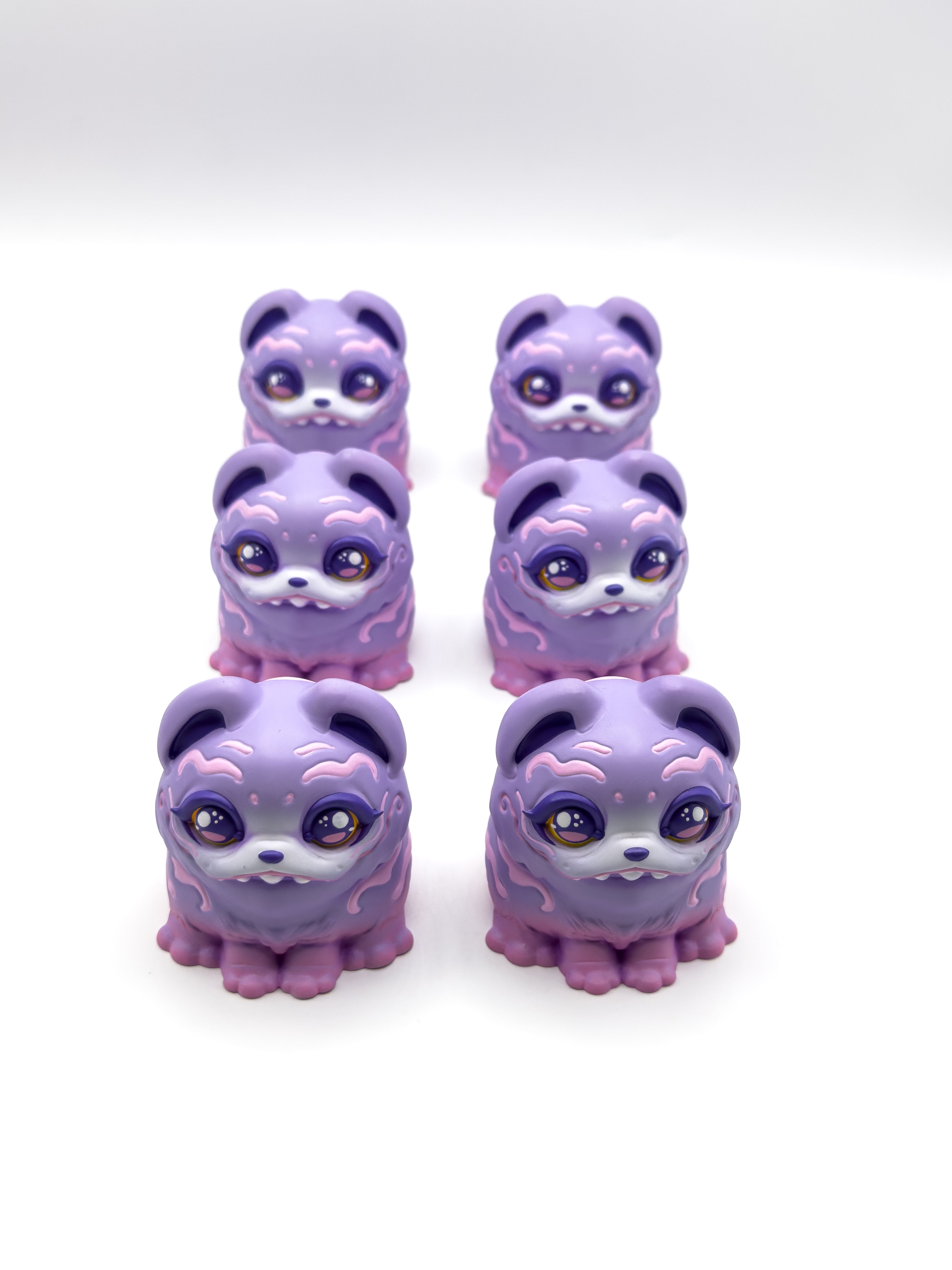 RuRu by Tomodachi Island: Six 4 resin figures, bear-like with sparkly eyes, arranged in pairs. Limited edition, available at Strangecat Toys.