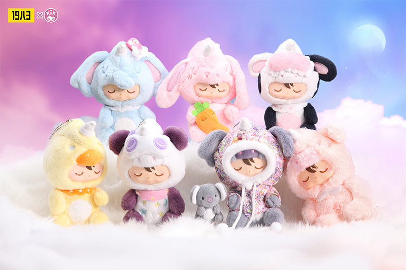 QUAY Animal Pajamas Blind Box Series by KIK featuring a group of stuffed animals, including a unicorn face and horn.