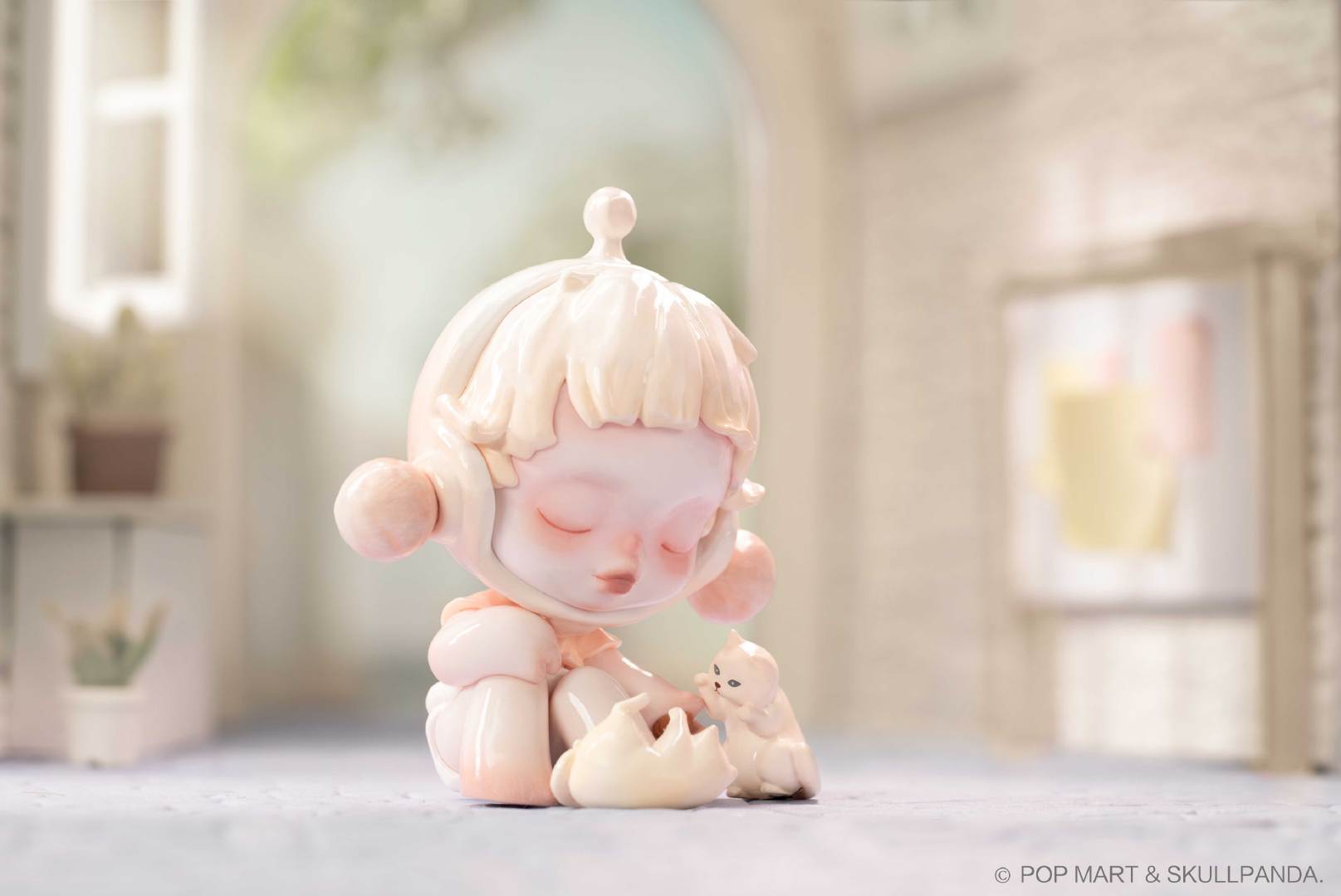 Skullpanda The Warmth Blind Box Series: A figurine of a girl with a cat, part of the toy collection.