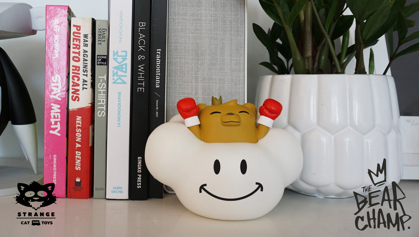 Vinyl art toy lamp featuring a toy bear in a cloud, a white planter with a boxing glove, a yellow stuffed animal, and more.