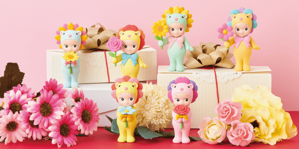 Sonny Angel mini figure Flower Gift Blind Box Series featuring small figurines and flowers with presents, a doll holding a flower, and various toys.